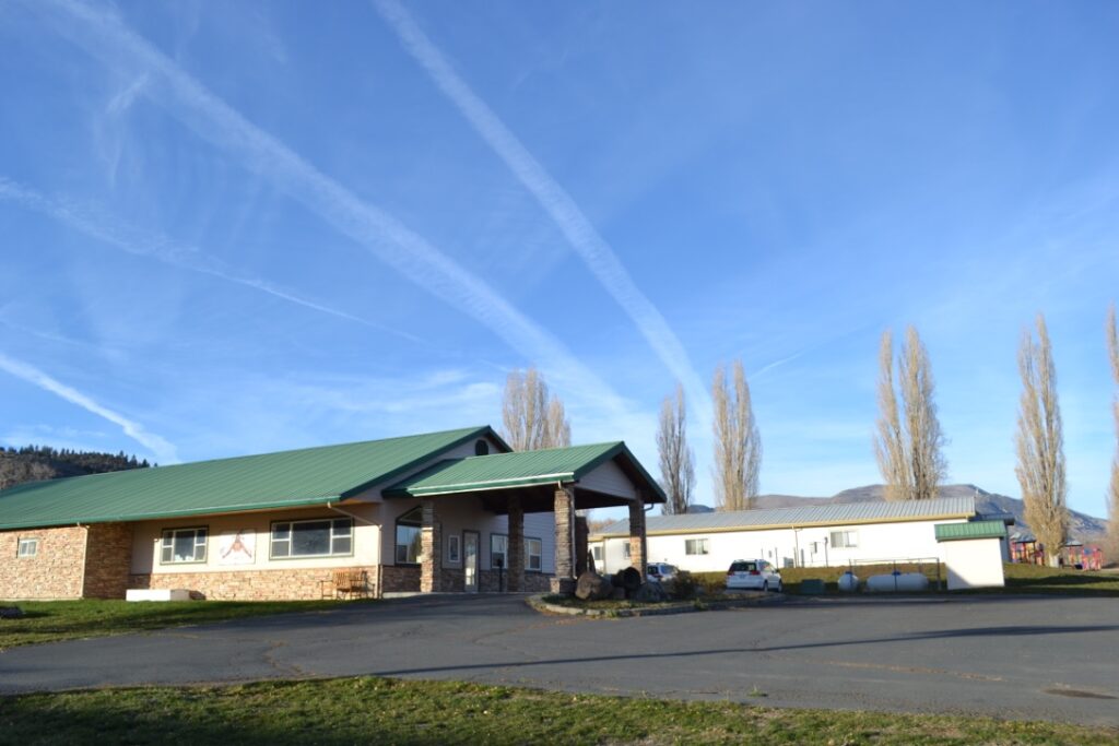 Picture of the outside of the health center on a bright sunny day